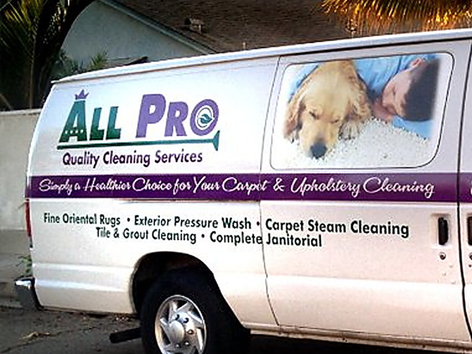 The side of the All Pro van: the logo, the motto stripe and the list of services lettered along the panel
